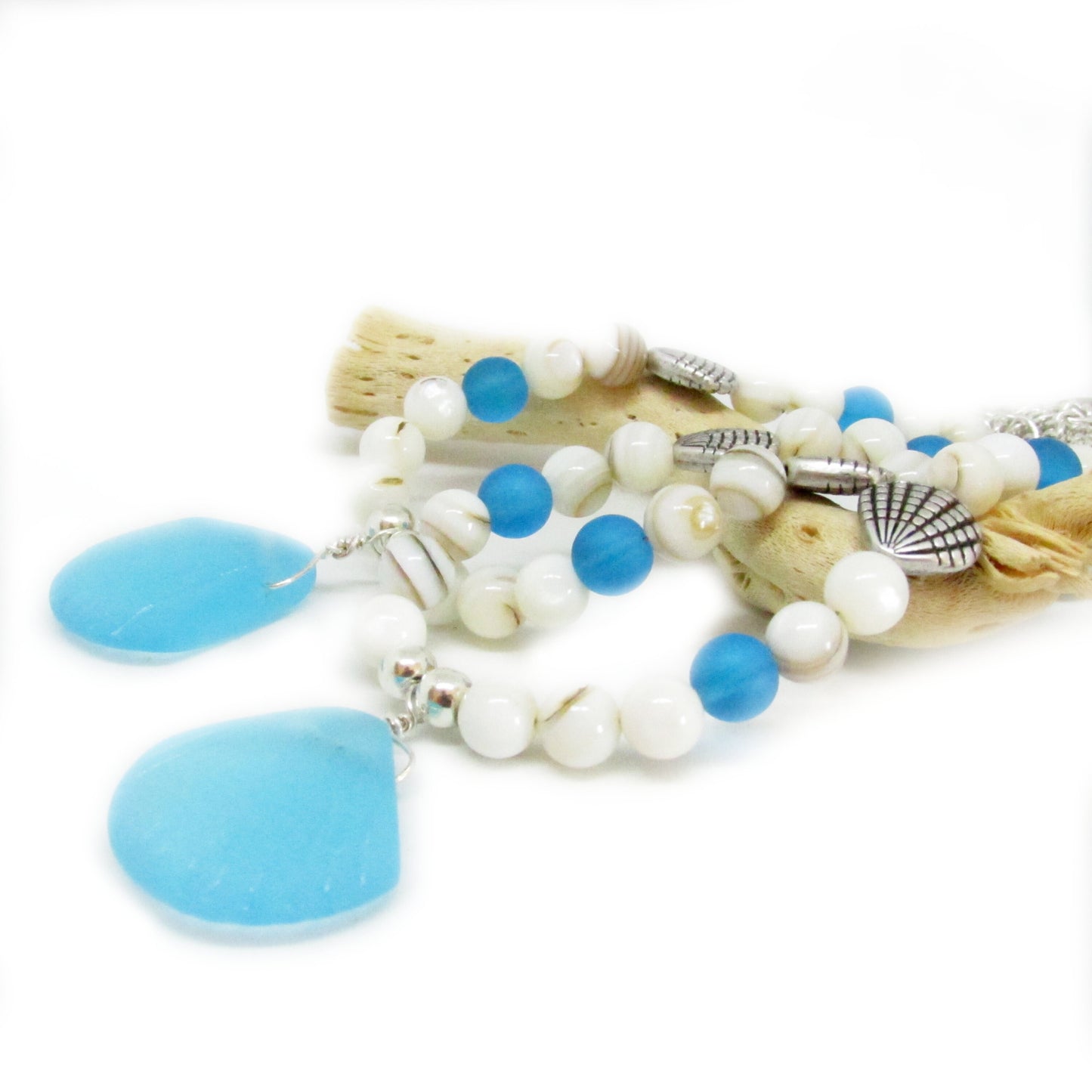 Sea glass drapery holdback with shell bead strand and blue frosted sea glass pendants, handmade coastal decor