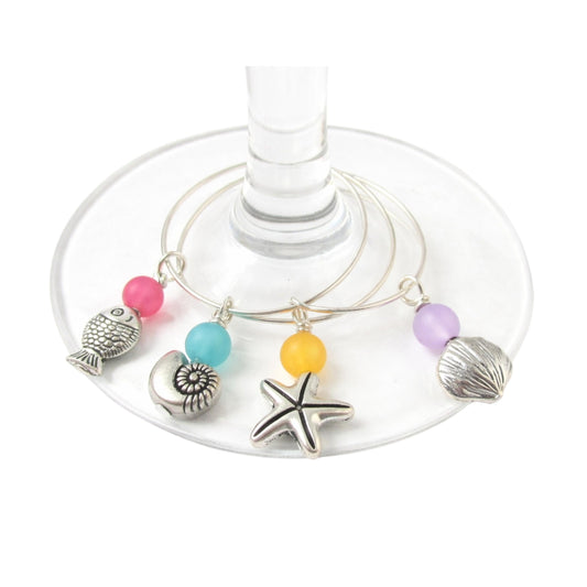 Handmade beach wine glass charms set of 4 with starfish, fish, shell and conch shell charms