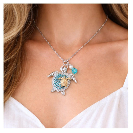 Handmade mom and baby sea turtle necklace with turquoise shell pendant and gold baby turtle on silver chain