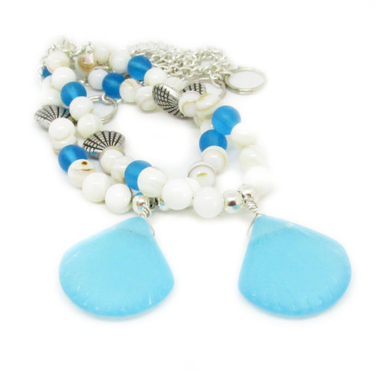Handcrafted sea glass curtain tieback with blue tumbled sea glass pendants and white shell beads