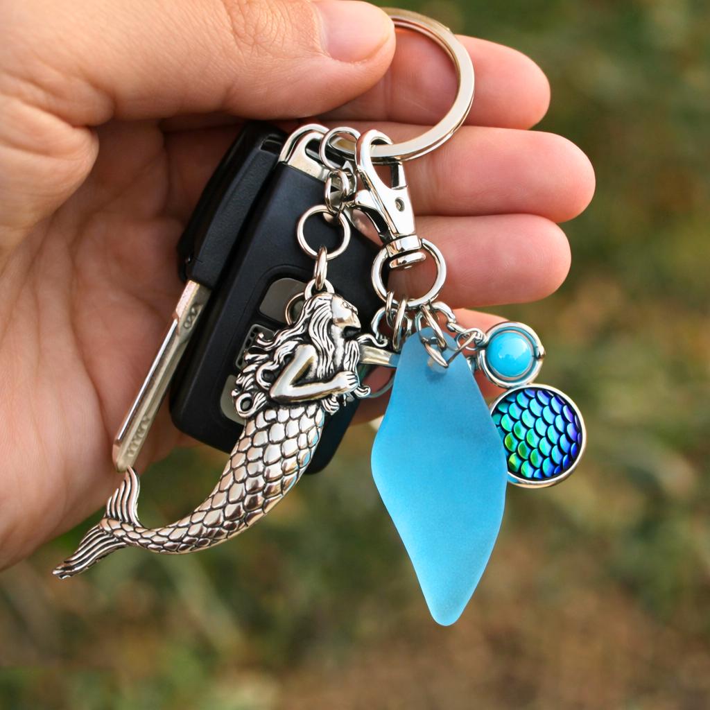 Large silver mermaid keychain with blue cultured sea glass charm and matching blue bead accent