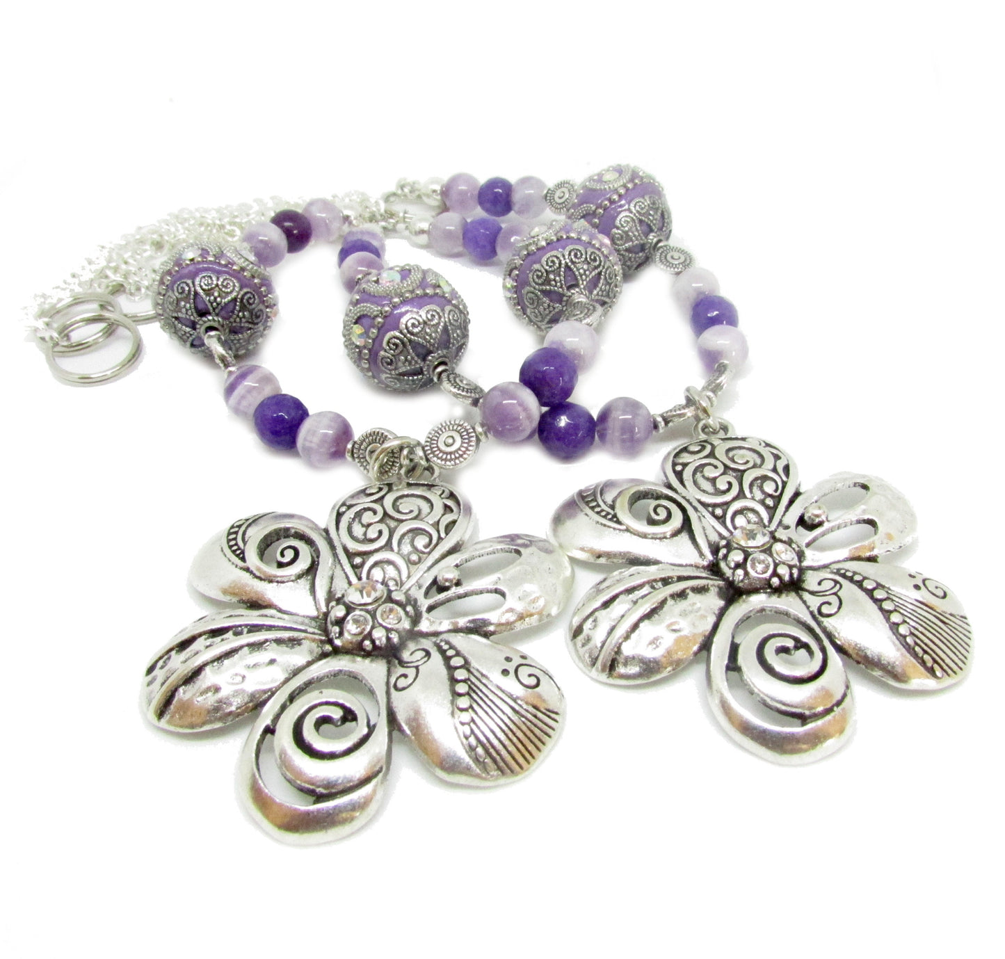 Handmade purple flower curtain tiebacks with large silver metal flower focal bead and purple stone ornate Indonesian beads