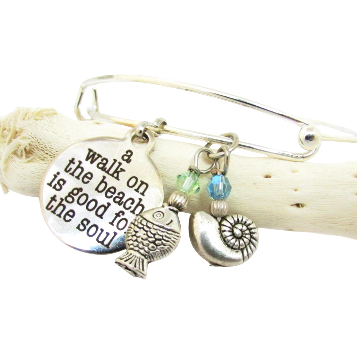 Adjustable coastal bangle bracelet with sea green and blue crystal fish and snail charms, beach lover gift for her