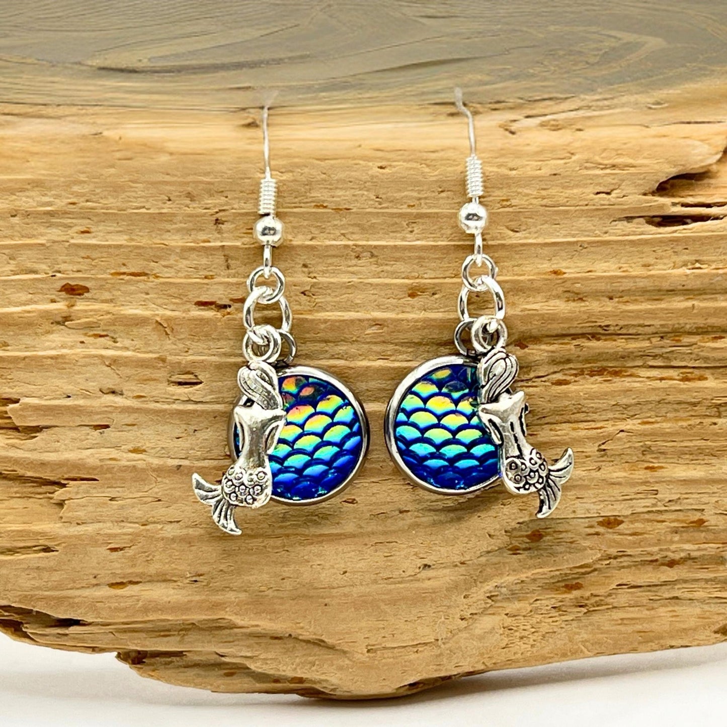 Round iridescent fish scale pendant earrings with silver mermaid charms, 1.5 inch surgical steel drop coastal jewelry