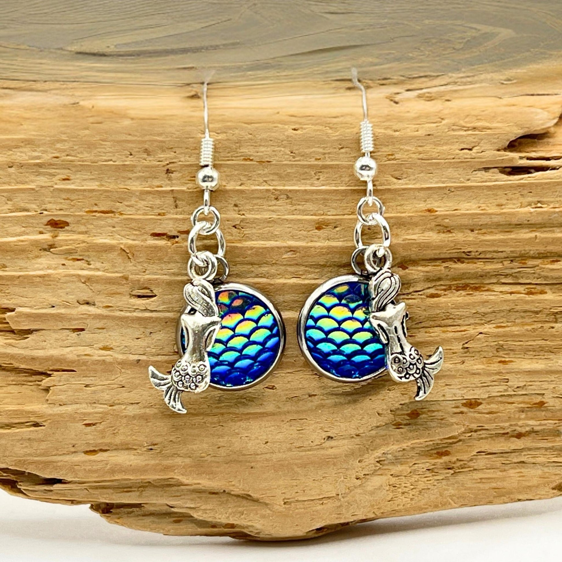 Round iridescent fish scale pendant earrings with silver mermaid charms, 1.5 inch surgical steel drop coastal jewelry
