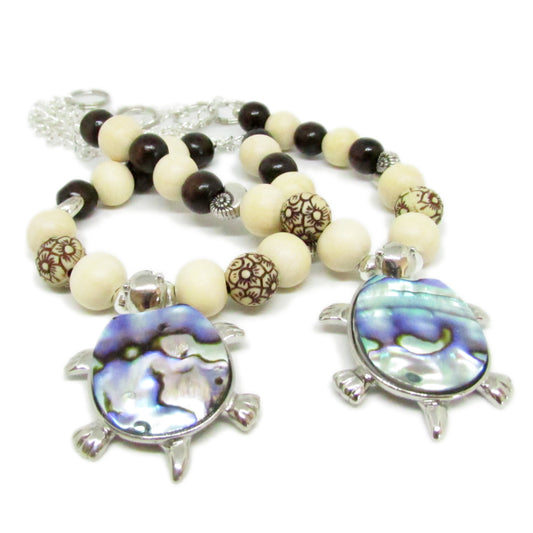 Handmade sea turtle curtain tiebacks with abalone shell pendant and wood beads, coastal nautical decor set of 2