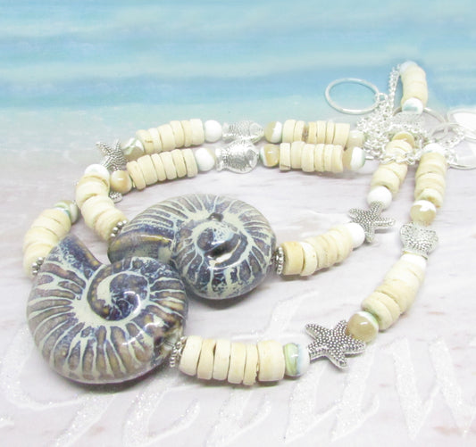 Handmade seashell curtain tiebacks with large ceramic shell focal bead, coconut shells and silver starfish accents, set of 2
