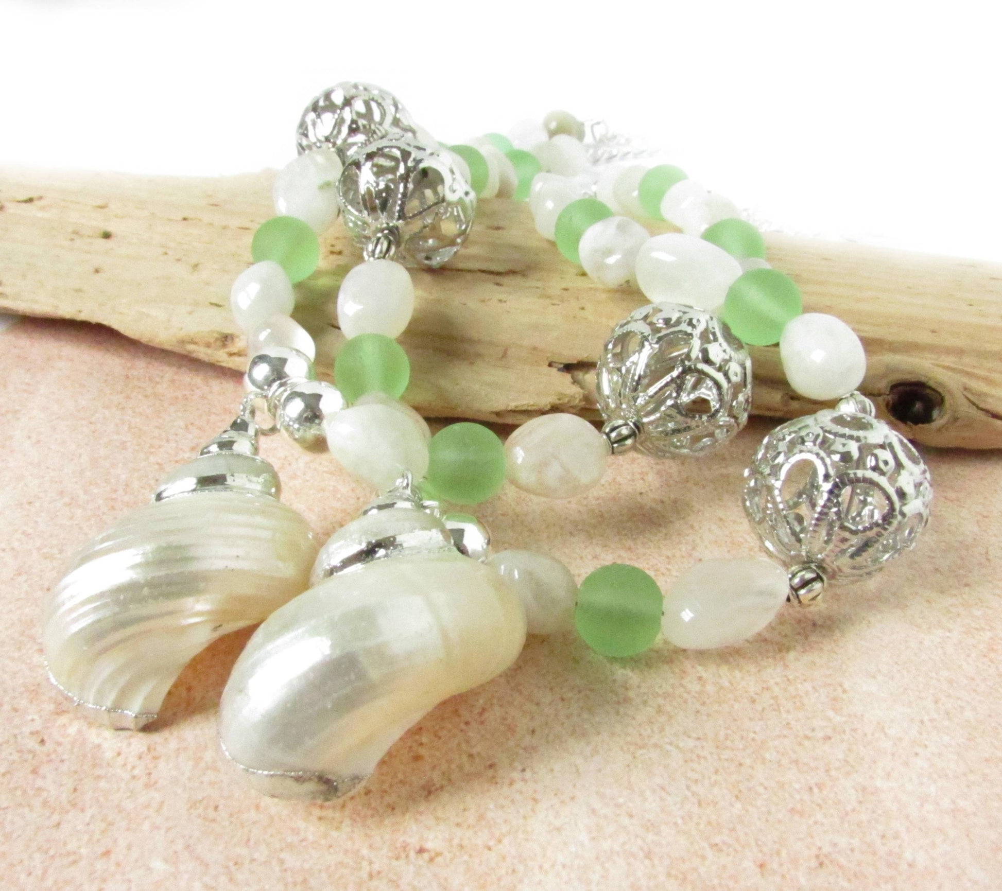Handmade seashell curtain tiebacks with white stone beads and seafoam sea glass, coastal home decor set of 2