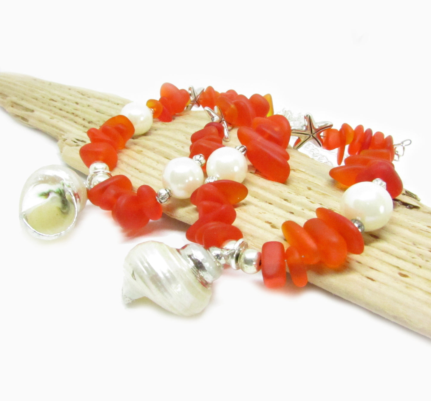 Handmade seashell curtain tiebacks with natural shell pendant, tangerine sea glass bead chips and silver starfish accents