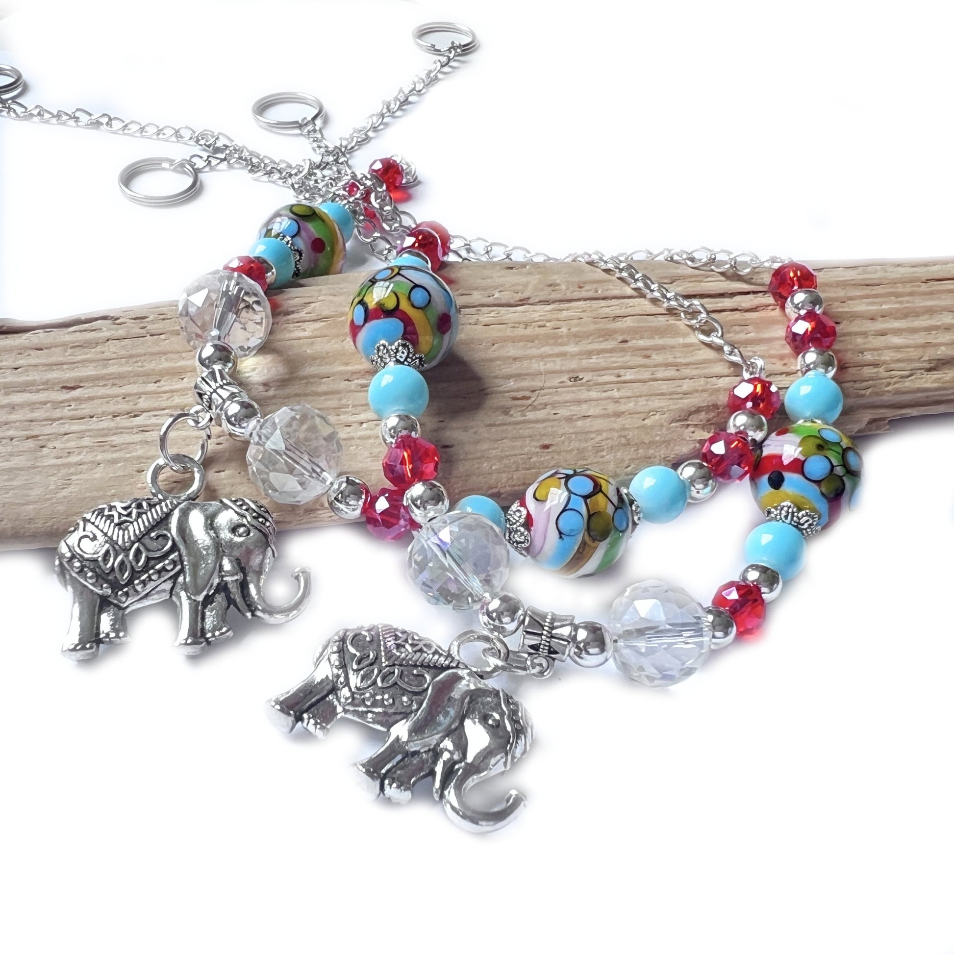 Sea glass drapery holdback with shell bead strand and blue frosted sea glass pendants, handmade coastal decor