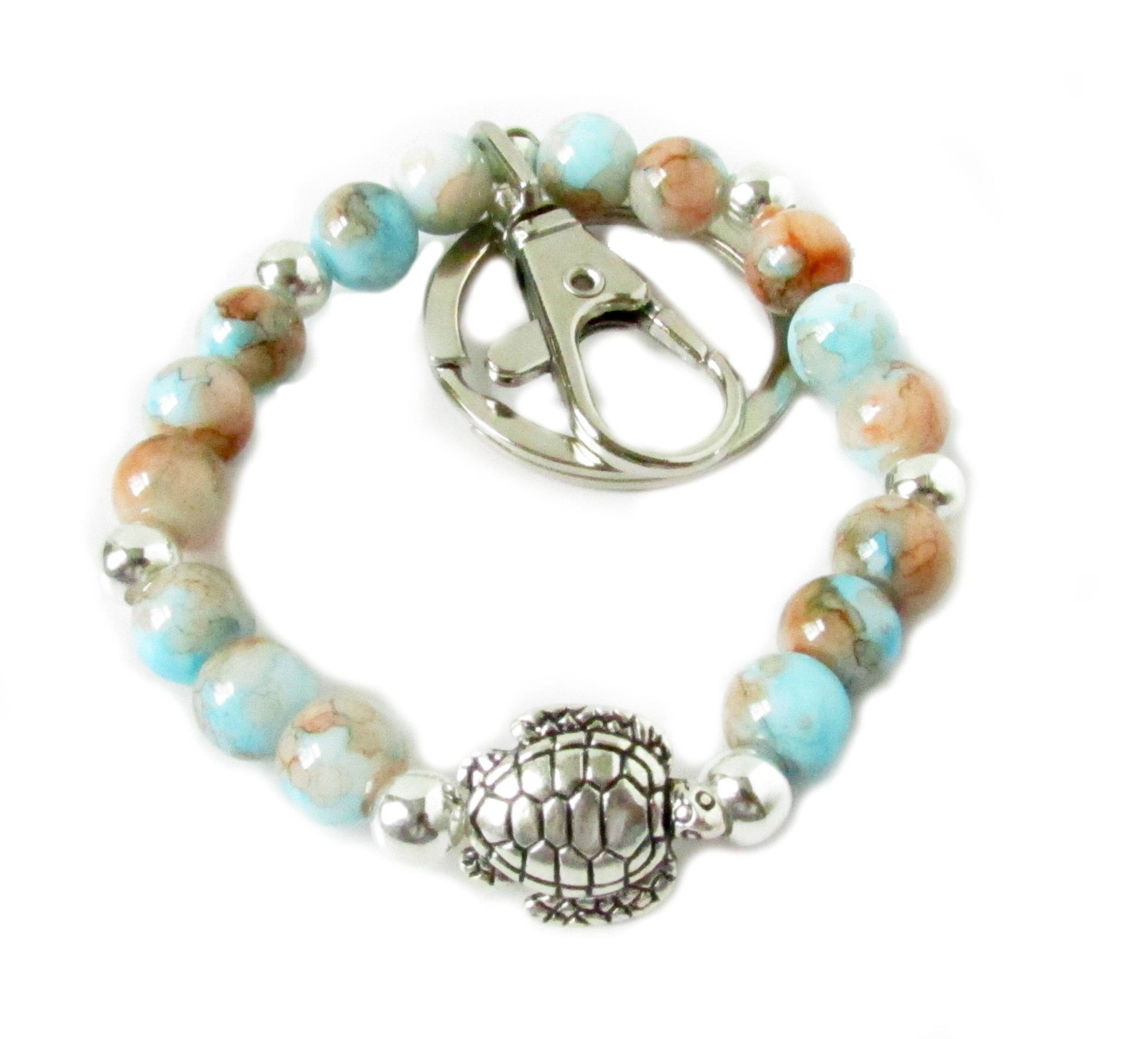 Elastic coastal wristlet bracelet with sea turtle focal charm and mottled glass beads, beach lover gift