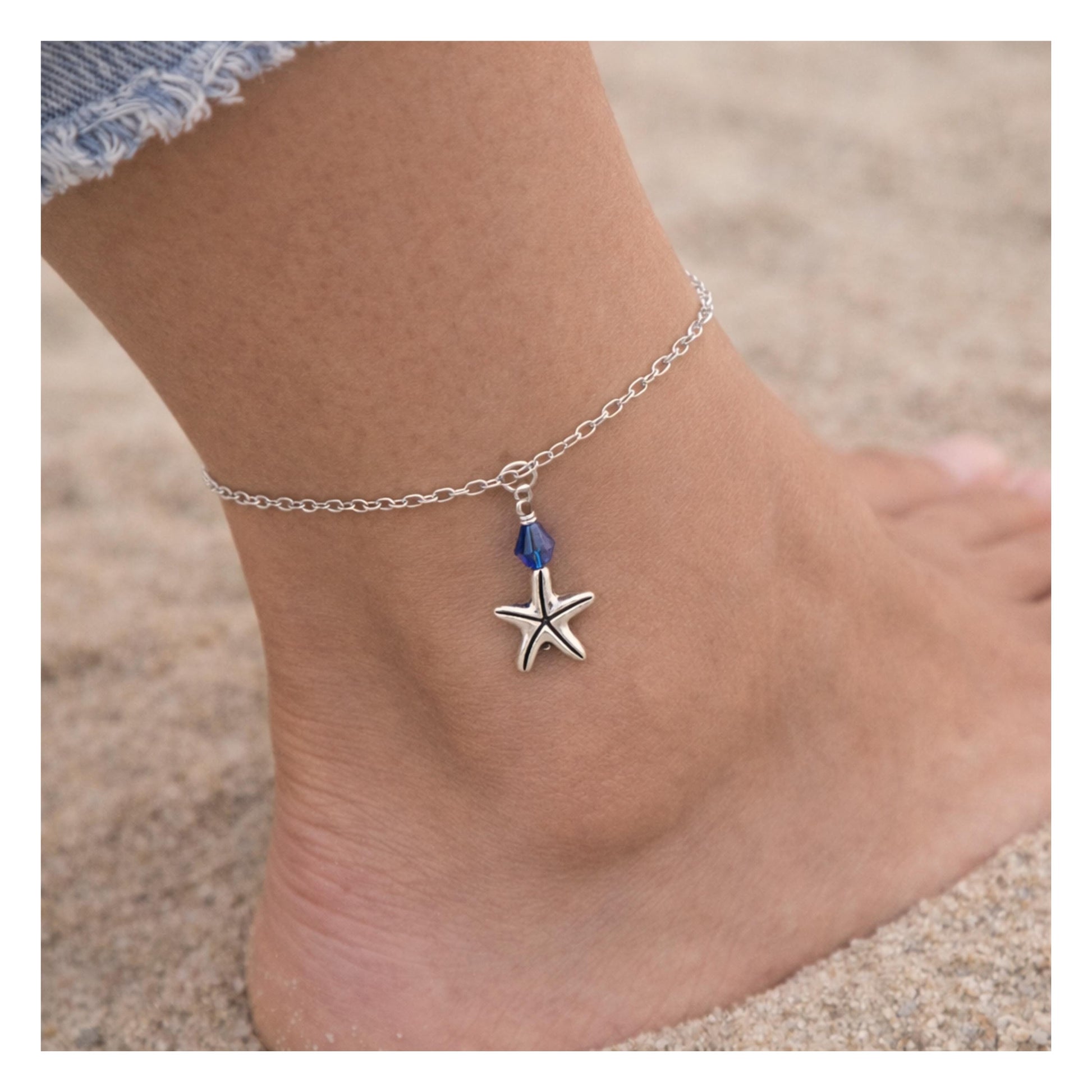 Dainty silver chain starfish anklet with blue crystal charm — handmade coastal beach jewelry