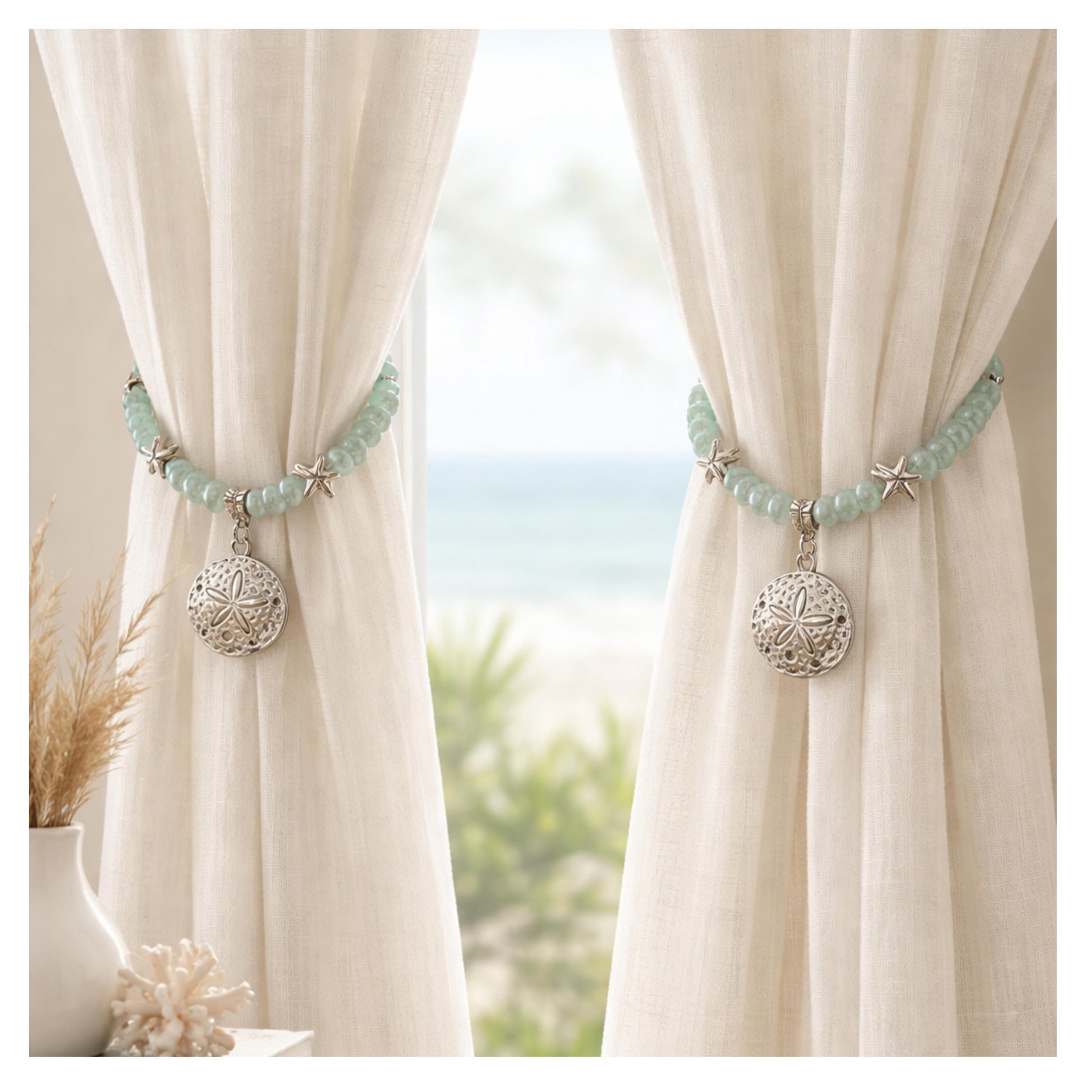 Sand dollar and sea glass curtain tiebacks shown styled on sheer curtains — handmade coastal beach drapery holdbacks