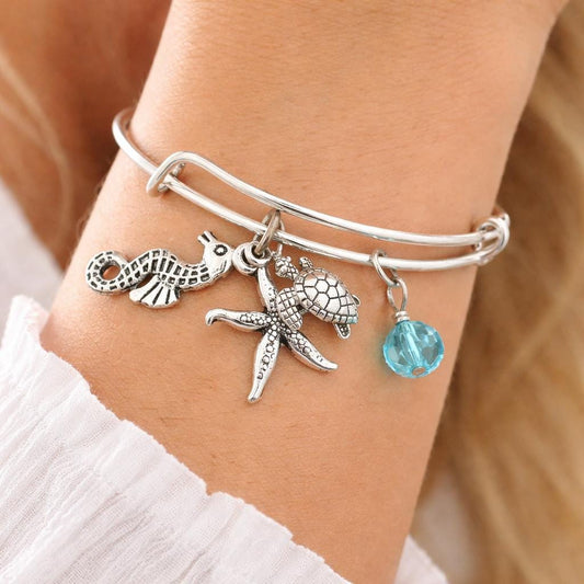 Sea turtle, starfish, and seahorse charm bangle bracelet — handmade coastal beach jewelry