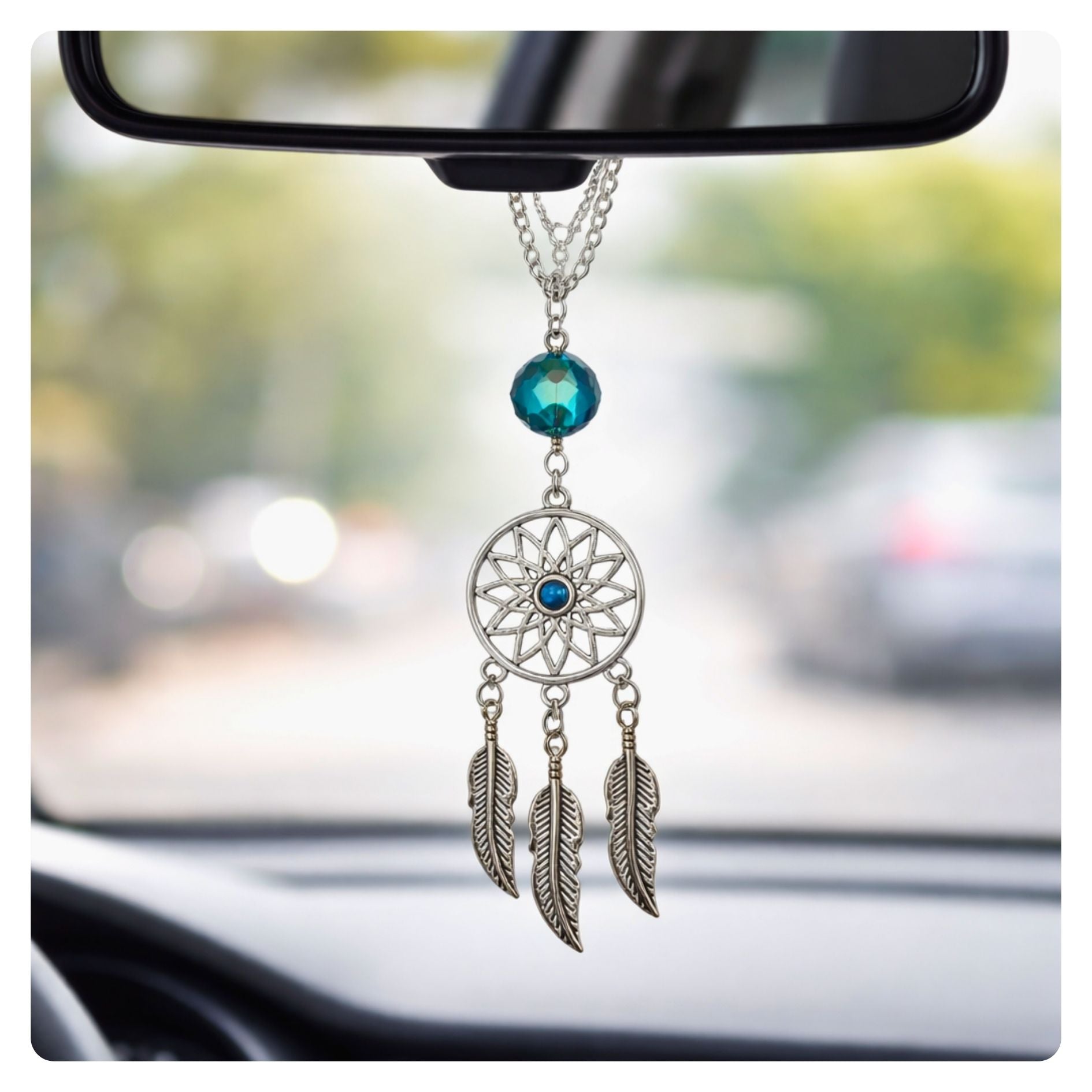 Dream catcher rearview mirror charm shown hanging from a car mirror — handmade boho car accessory