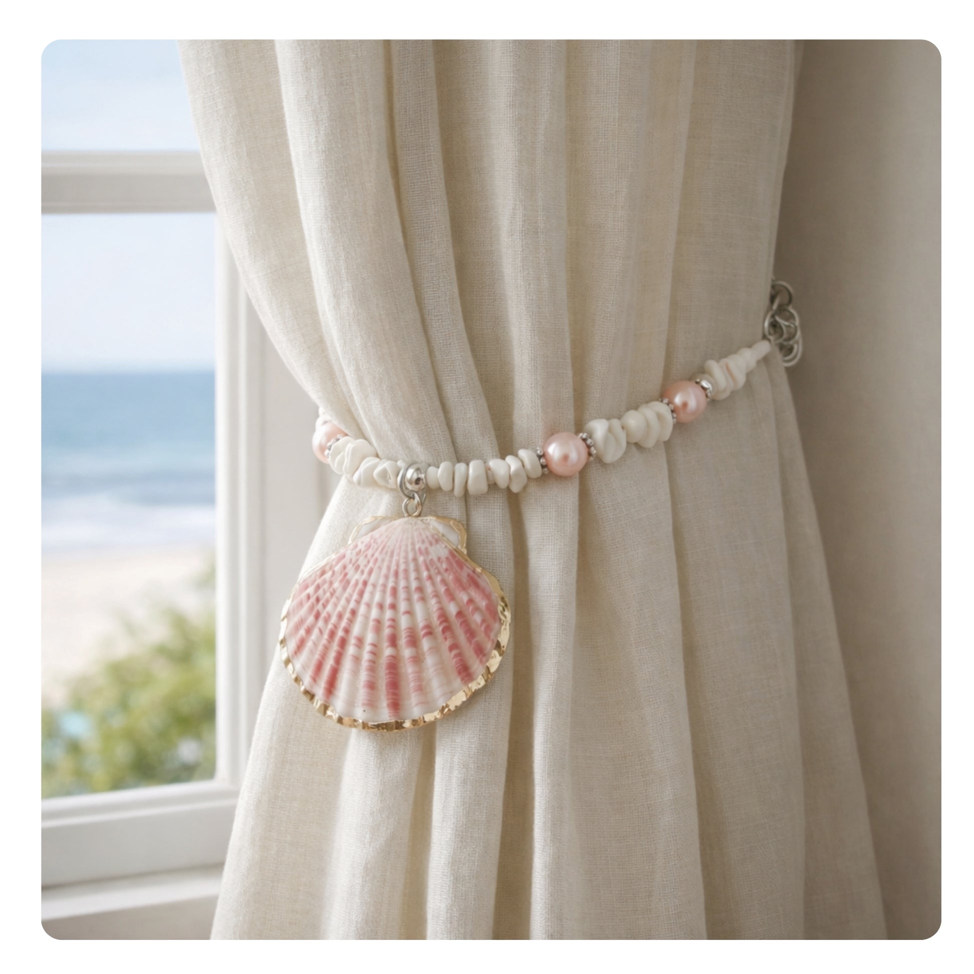 Set of two pink shell beaded curtain tiebacks shown styled on sheer curtains — handmade coastal beach window ornaments