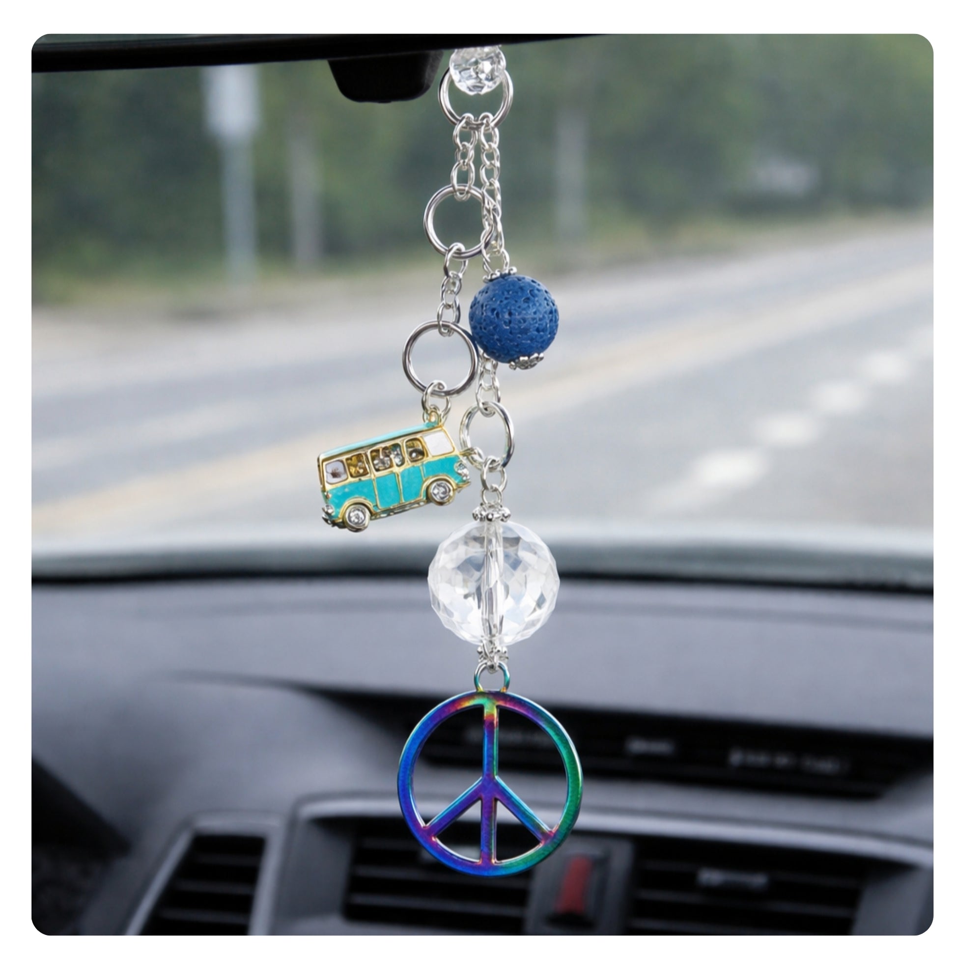 Retro peace sign car charm shown hanging from a rearview mirror — handmade boho car accessory