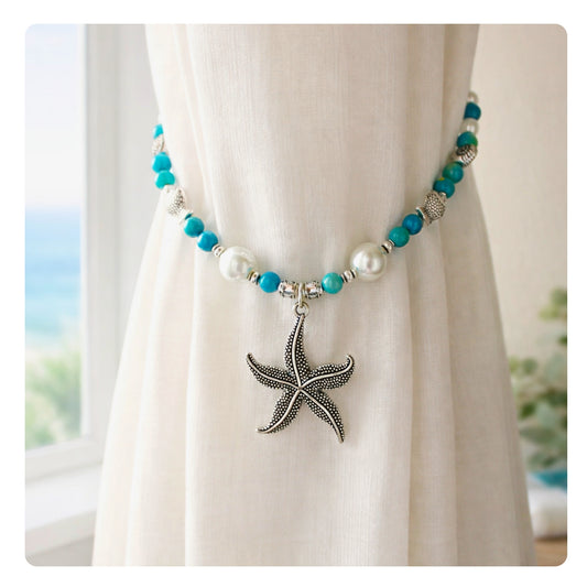 Beaded starfish curtain tiebacks shown styled on sheer curtains — handmade nautical beach home decor