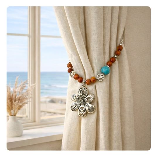 Set of two boho flower curtain tiebacks with wood beads and turquoise accents shown styled on sheer curtains — handmade bohemian home decor