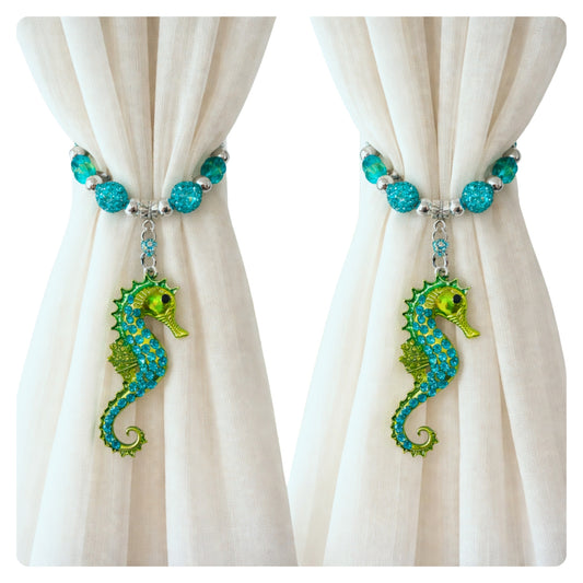 Rhinestone seahorse curtain tiebacks shown styled on sheer curtains — handmade coastal window accent home decor
